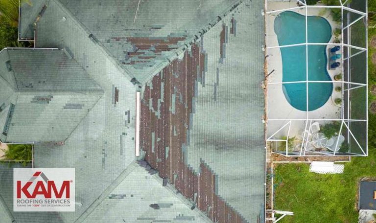 A Florida roof damaged by high winds from a seasonal storm